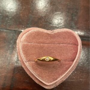 14k gold ring with diamond eye.